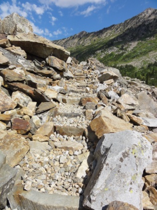 The trail traverses some rock slide areas, which can be tricky with a heavy pack on.